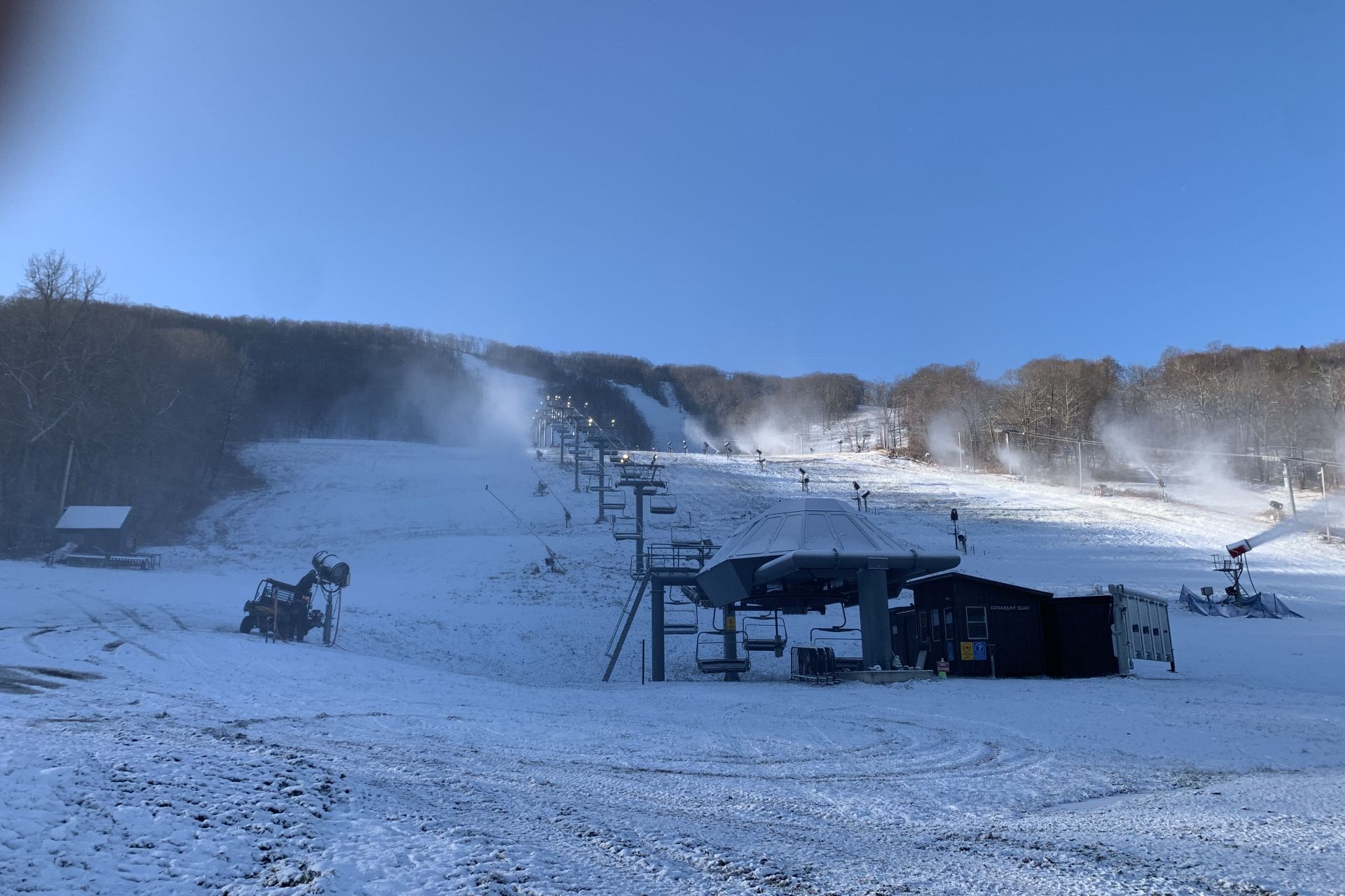 Snow guns firing on the mountain.