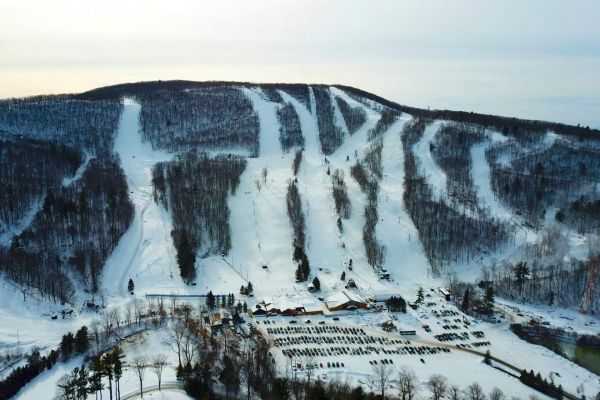 A winter drone photo of Catamount Resort. Click here for Winter Group Activities.