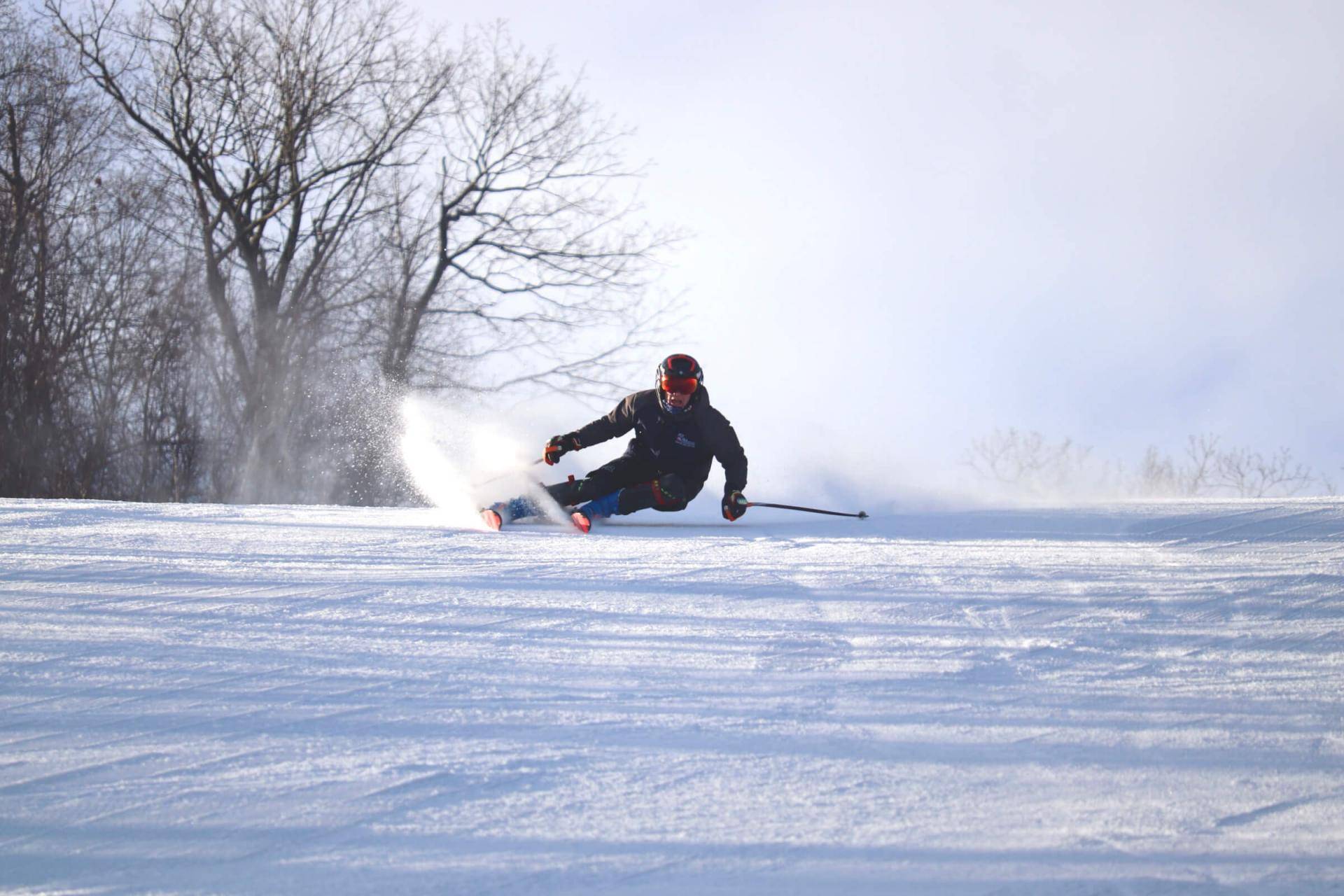 3 employees riding chairlift