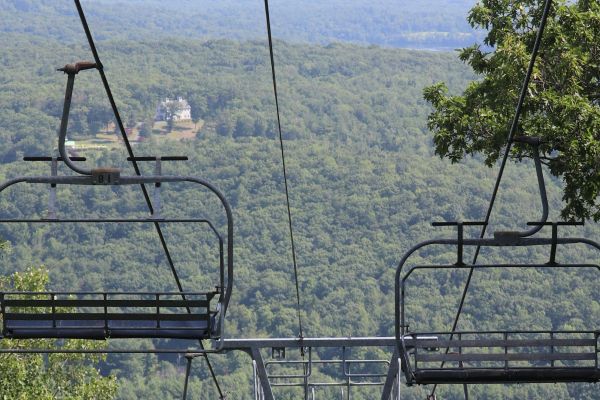 Two chairlifts with a view of the valley below Catamount Resort