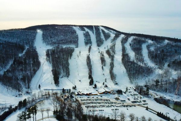 A winter drone photo of Catamount Resort. Click here for Winter Group Activities.